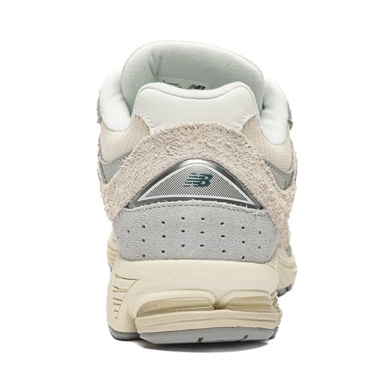 Chaussure athlétique New Balance 2002 pour hommes - Blanc lin / Gris
