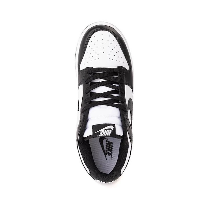 Chaussure athlétique Nike Dunk Low pour femmes - Blanc / Noir