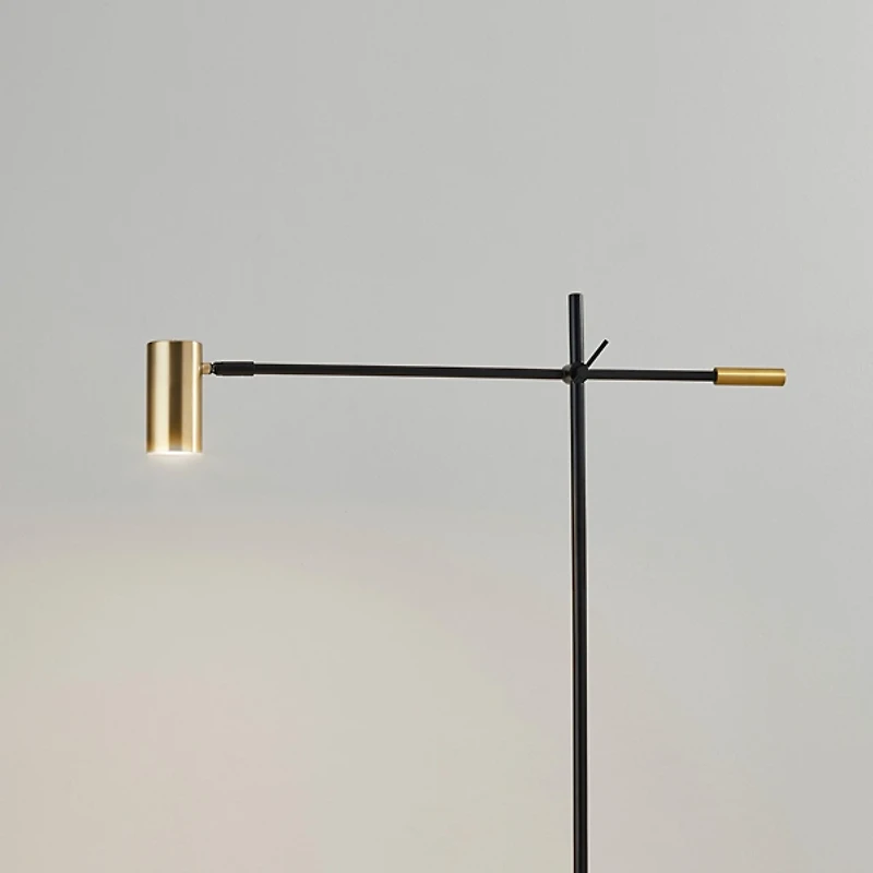 Antique Brass and Black Adjustable Arm Floor Lamp