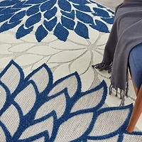 Navy Floral Burst Round Outdoor Area Rug, 7x7