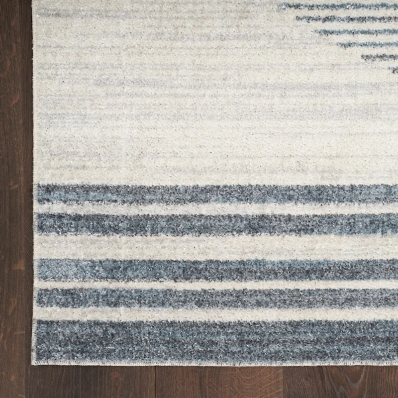 Blue and Ivory Linear Orb Washable Area Rug, 5x7