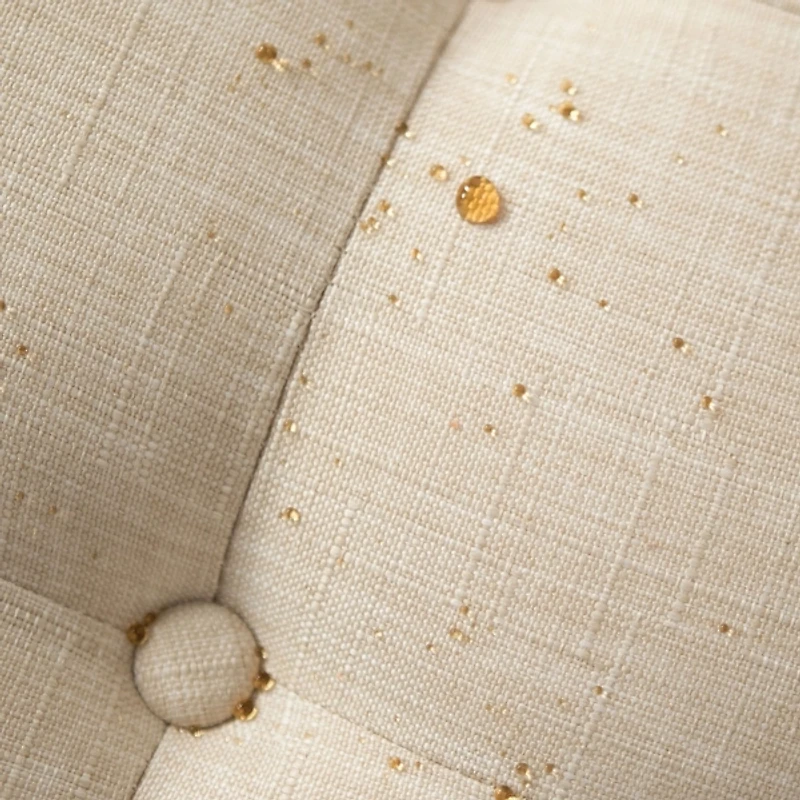 Round Tan Cepheus Tufted Ottoman