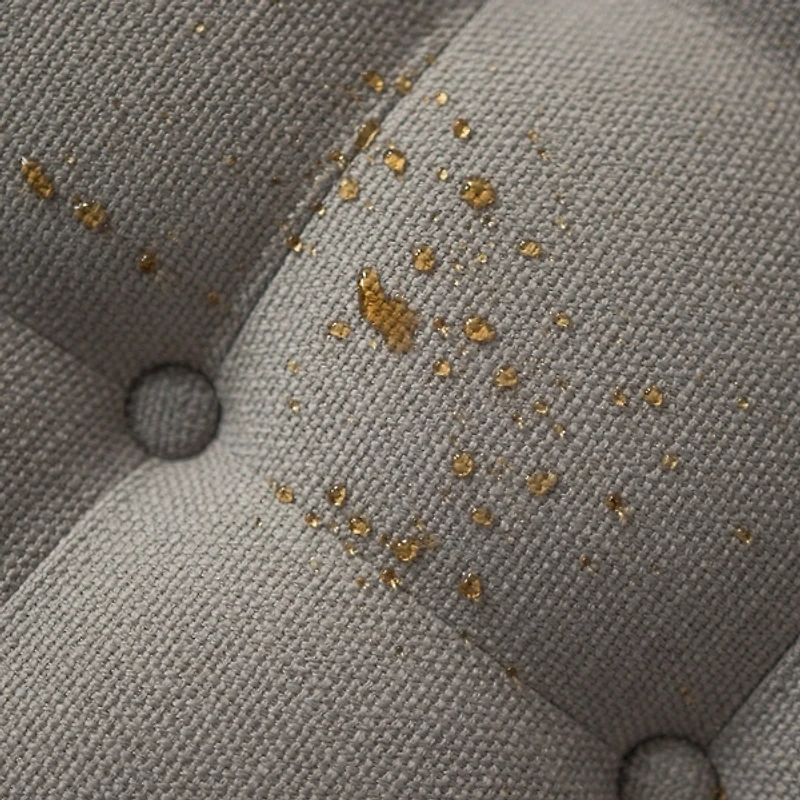 Round Gray Cepheus Tufted Ottoman