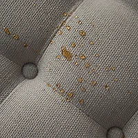 Round Gray Cepheus Tufted Ottoman