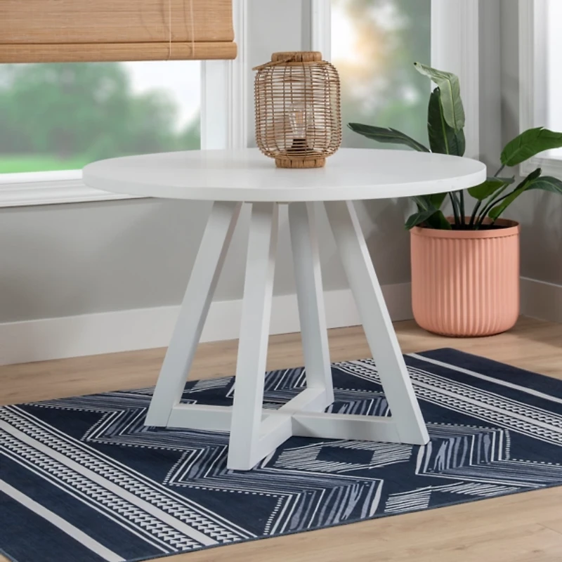 White Round Criss-Cross Base Dining Table