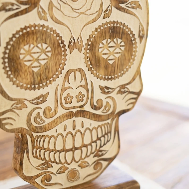 Carved Wooden Skull Statue