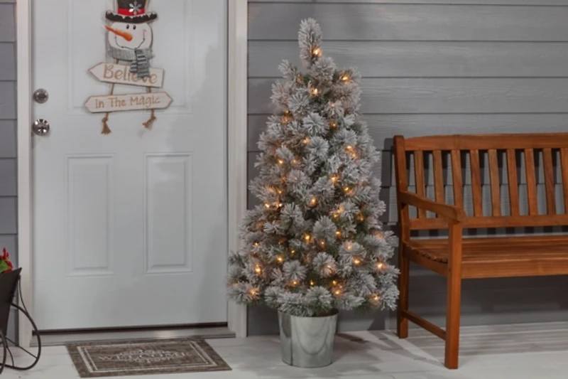 4.5 ft. Pre-Lit Flocked Potted Pine Christmas Tree