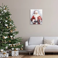 Santa with Red Gift Canvas Art Print