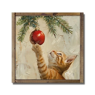 Kitten and Ornament Framed Art Print