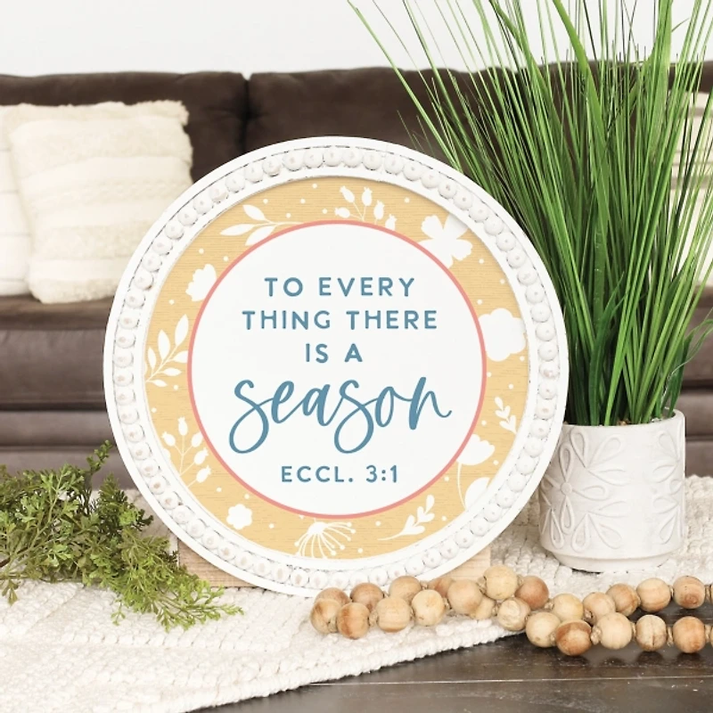 There is a Season Round Wall Plaque
