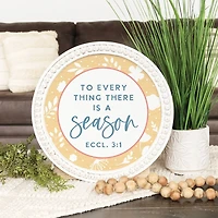 There is a Season Round Wall Plaque