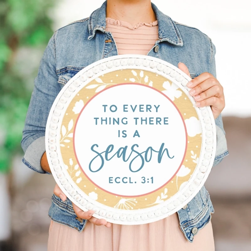 There is a Season Round Wall Plaque