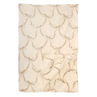 Tan and White Flowy Bows Plush Throw