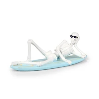 Billie Skeleton on Surfboard