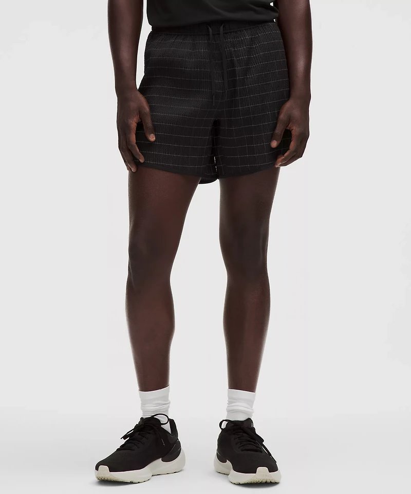 Mile Maker Reflective Linerless Short 6" | Men's Shorts