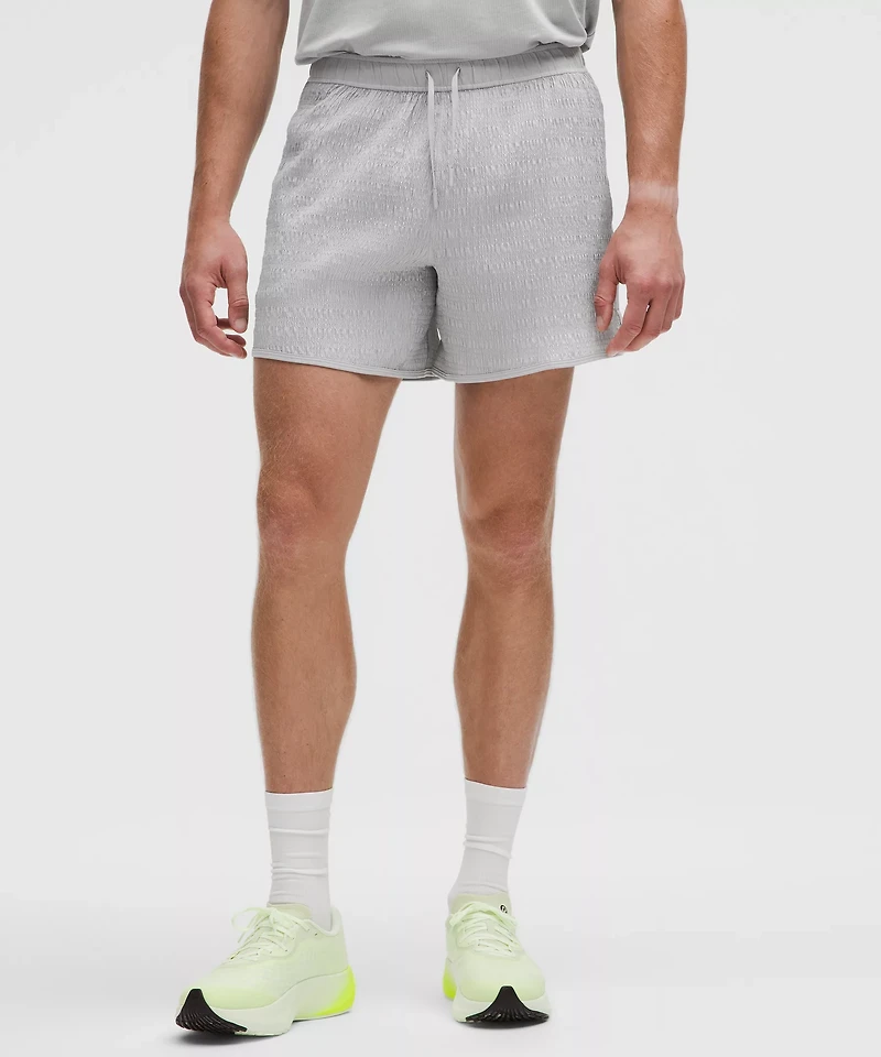Mile Maker Reflective Linerless Short 6" | Men's Shorts