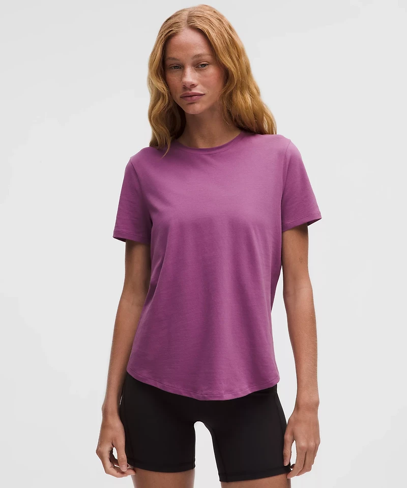 Love Curved-Hem Crewneck T-Shirt | Women's Short Sleeve Shirts & Tee's