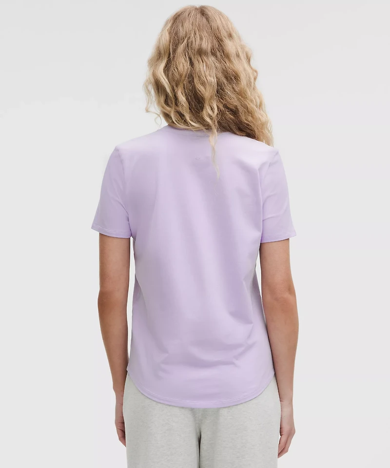 Love Curved-Hem Crewneck T-Shirt | Women's Short Sleeve Shirts & Tee's