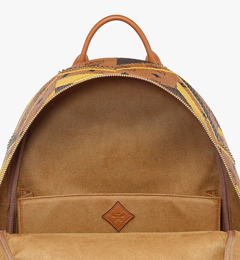 Studded Stark Backpack in Mega Herringbone Visetos