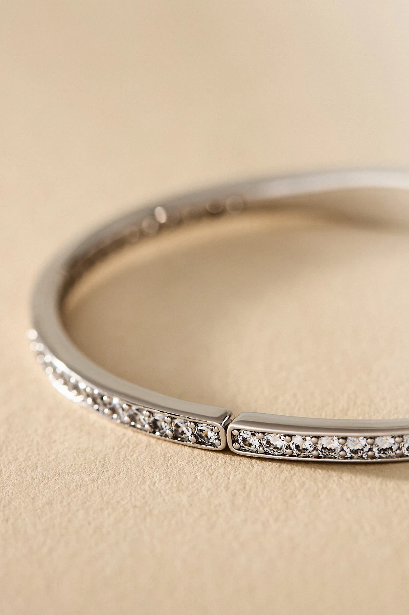 NADRI Half Pavé Crystal Hinged Oval Bangle Bracelet