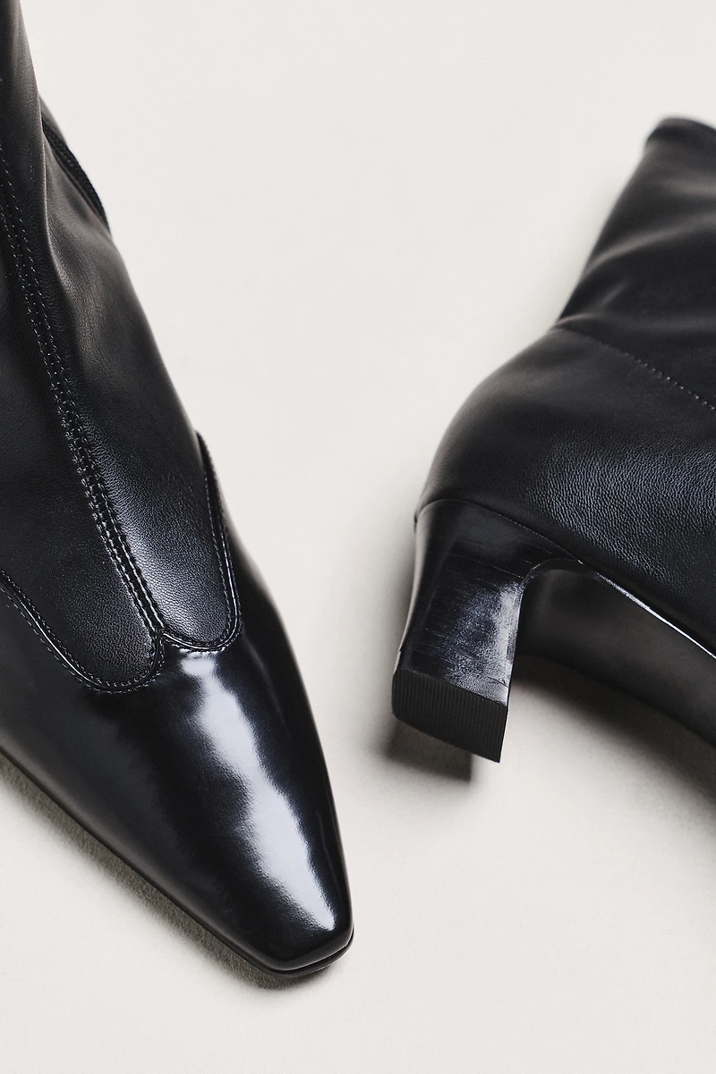 Maeve Cap-Toe Stretch Ankle Boots