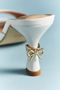 Maeve Metal Bow Open-Toe Mule Heels