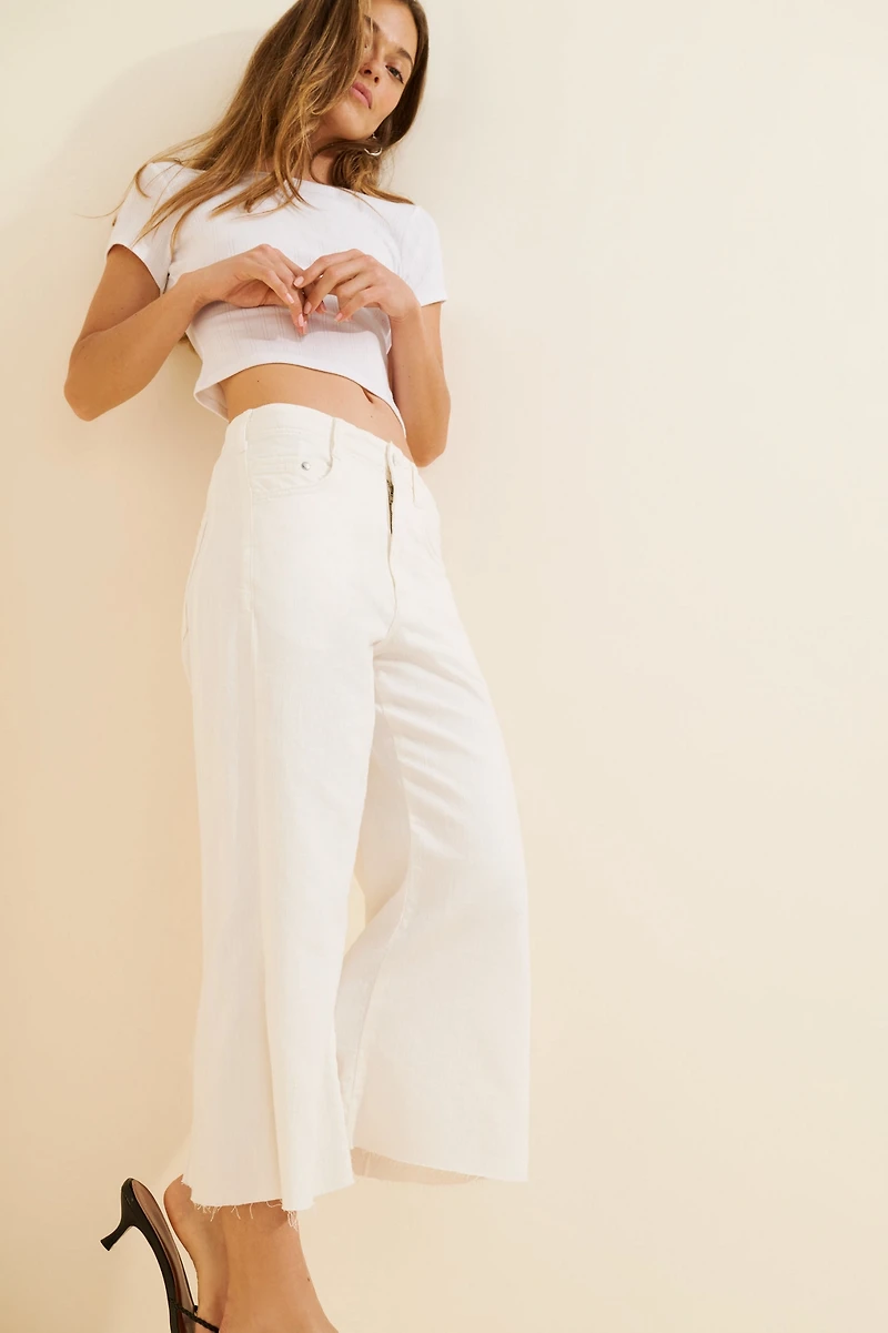 Pilcro The Adi Mid-Rise Frayed Relaxed Flare Jeans: Crop Edition