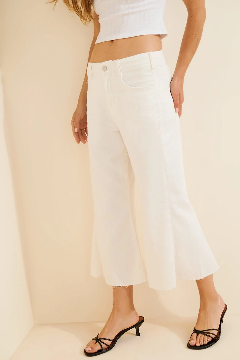Pilcro The Adi Mid-Rise Frayed Relaxed Flare Jeans: Crop Edition