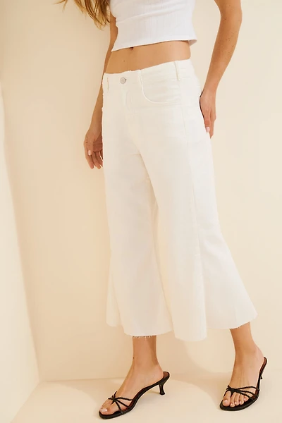 Pilcro The Adi Mid-Rise Frayed Relaxed Flare Jeans: Crop Edition