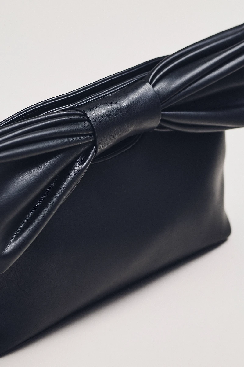 Cutout Handle Bow Clutch