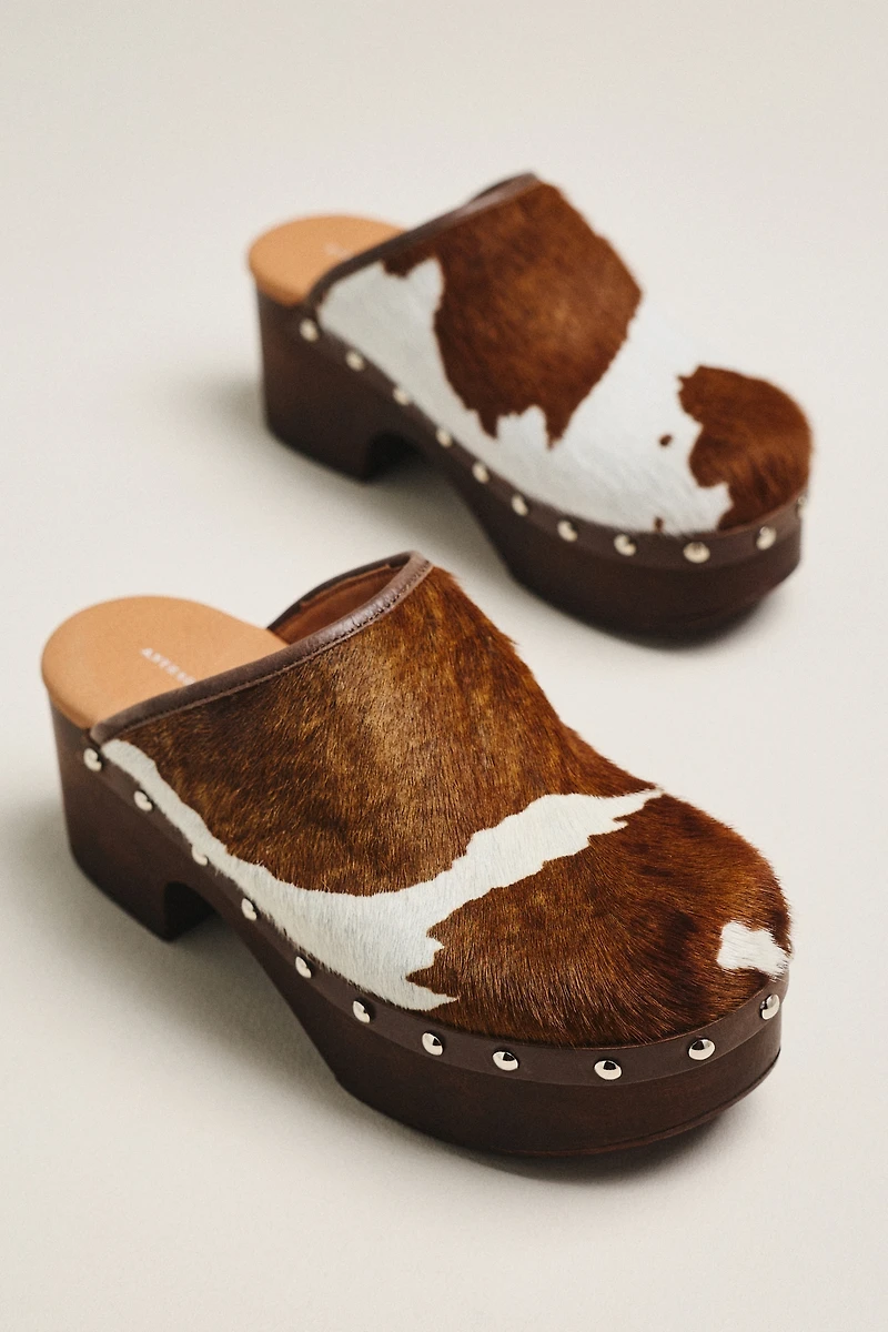 By Anthropologie Studded Cow Print Wood-Bottom Clogs