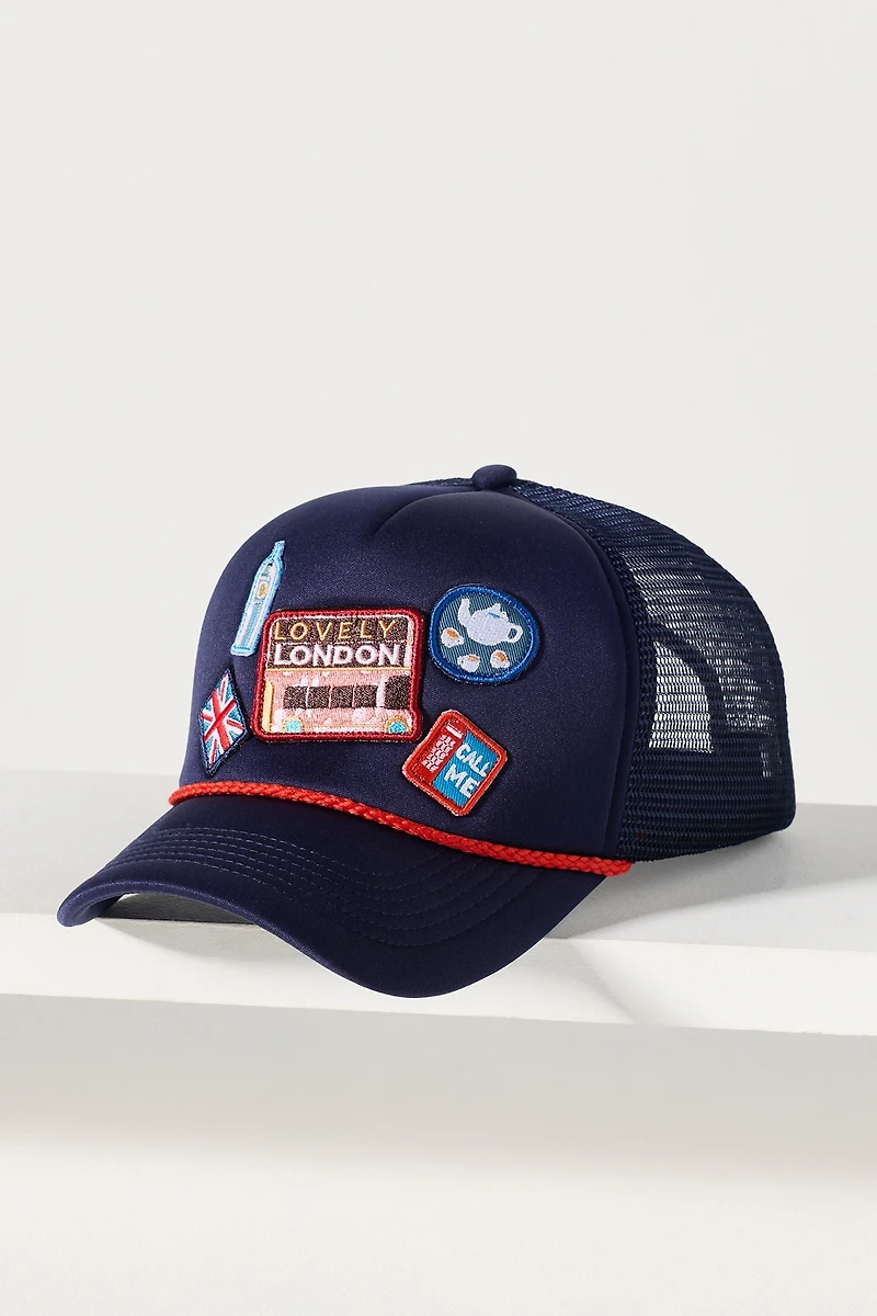 By Anthropologie Travel Trucker Hat
