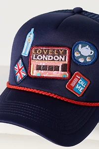 By Anthropologie Travel Trucker Hat