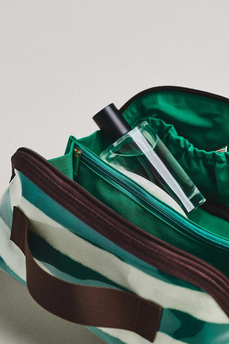 By Anthropologie Coated Terry Cosmetic Bag
