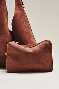 By Anthropologie Love Knot Faux Suede Buckle Slouchy Bag
