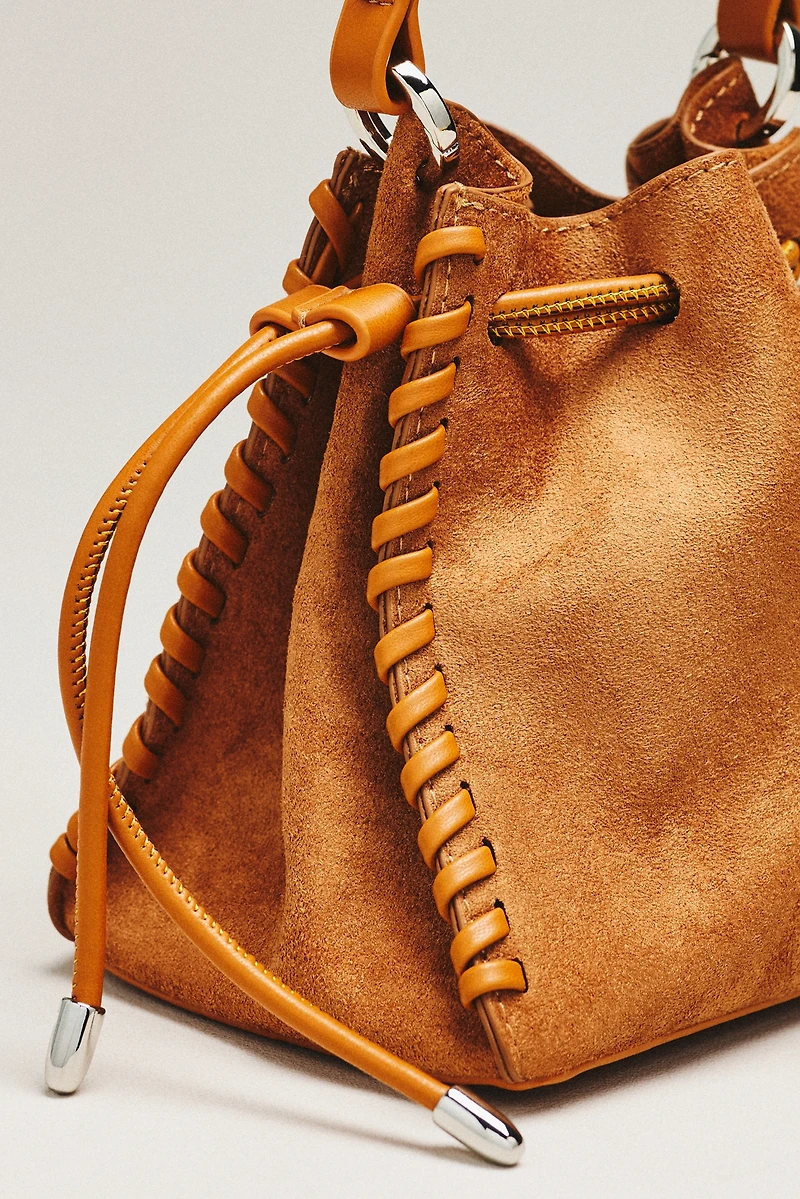 By Anthropologie Faux-Suede Whipstitch Satchel