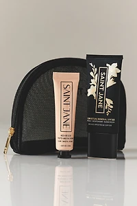 Saint Jane Sun Ritual Mineral SPF 30, Rich Rescue Phyto Mucin Cream, and Saint Jane Mesh Makeup Bag