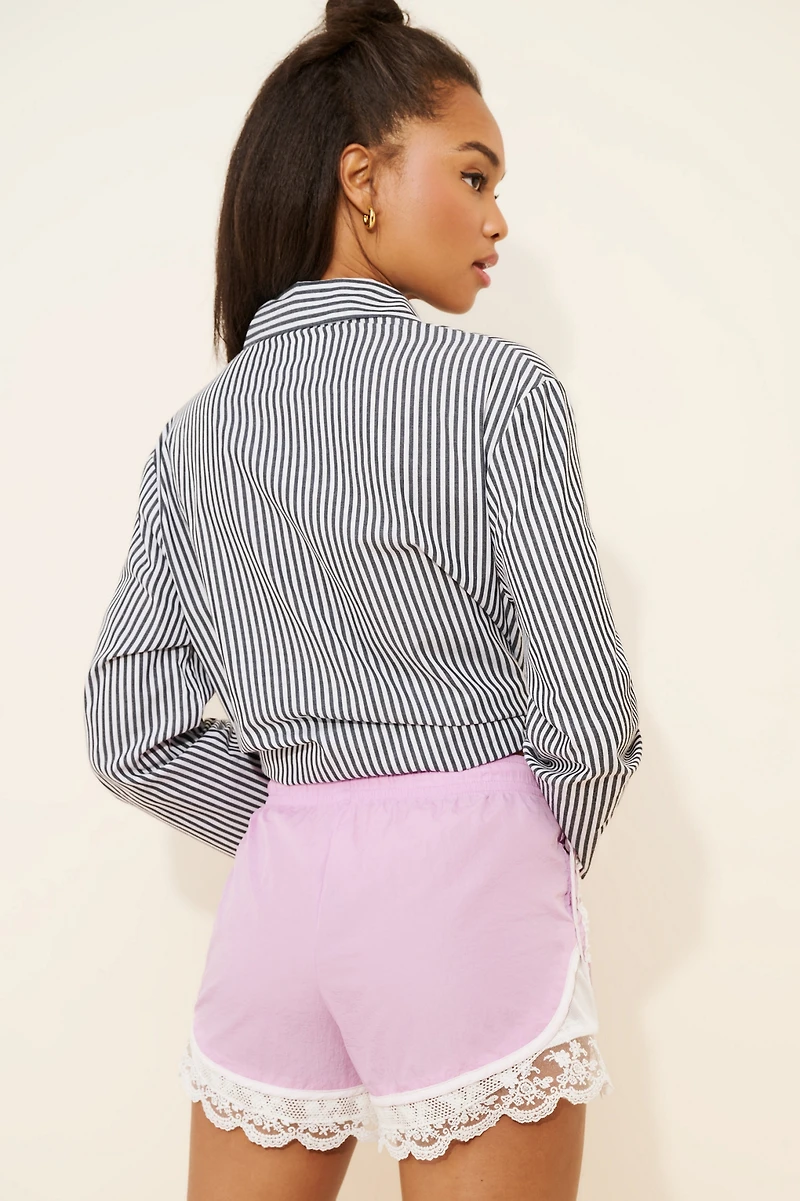 Daily Practice by Anthropologie Long Jump Lace-Trim Drawstring Shorts
