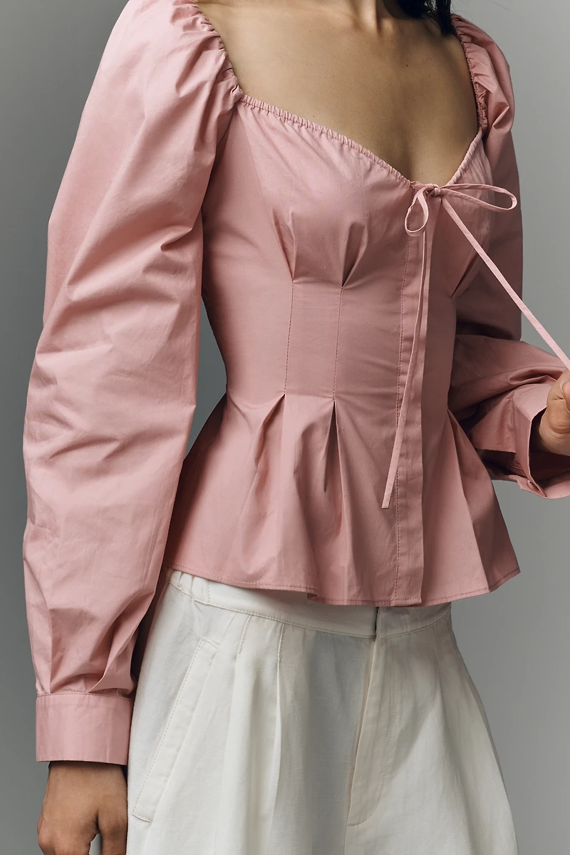 NIA Cloverfield Peplum Long-Sleeve Top