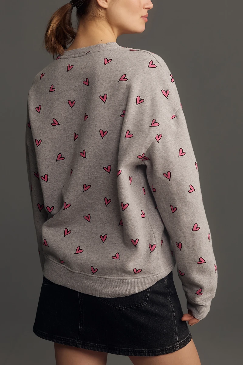 KULE The Oversized All Over Heart Sweatshirt