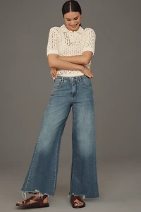 The Adi Regenerative Cotton Mid-Rise Flare Jeans by Pilcro