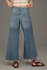 The Adi Regenerative Cotton Mid-Rise Flare Jeans by Pilcro