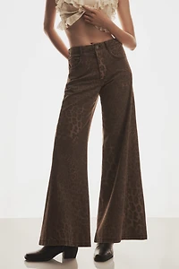 The Adi Leopard Mid-Rise Flare Jeans by Pilcro