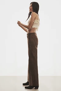 The Adi Leopard Mid-Rise Flare Jeans by Pilcro