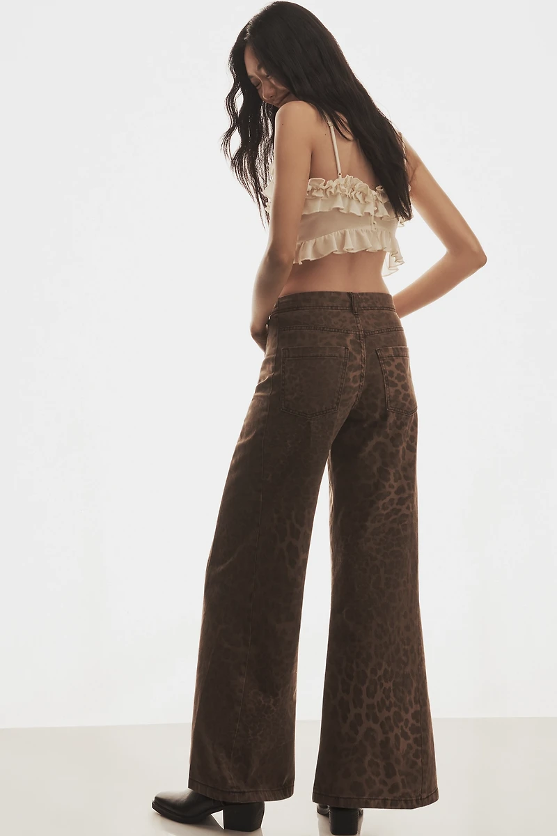 The Adi Leopard Mid-Rise Flare Jeans by Pilcro