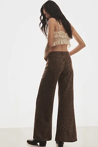 The Adi Leopard Mid-Rise Flare Jeans by Pilcro
