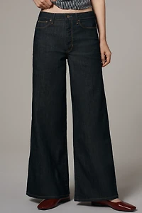 The Robbie High-Rise Flared Fray Jeans by Pilcro