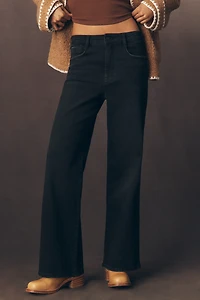 The Robbie High-Rise Flared Fray Jeans by Pilcro