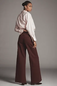Seventy + Mochi Mid-Rise Wide-Leg Twisted Jeans