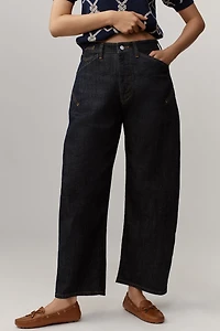The Kayden Clean High-Rise Barrel Jeans by Pilcro